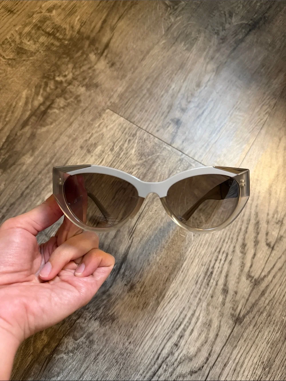 Prada Cat-Eye Sunglasses in Light Gray and Clear